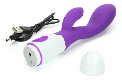 DILDO CON ESTIMULADOR RECARGABLE.